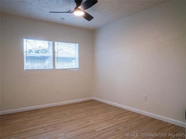 4008 NW Meadowbrook, Lawton, OK 73505 - spare room featuring light hardwood / wood-style flooring, ceiling fan, and a textured ceiling