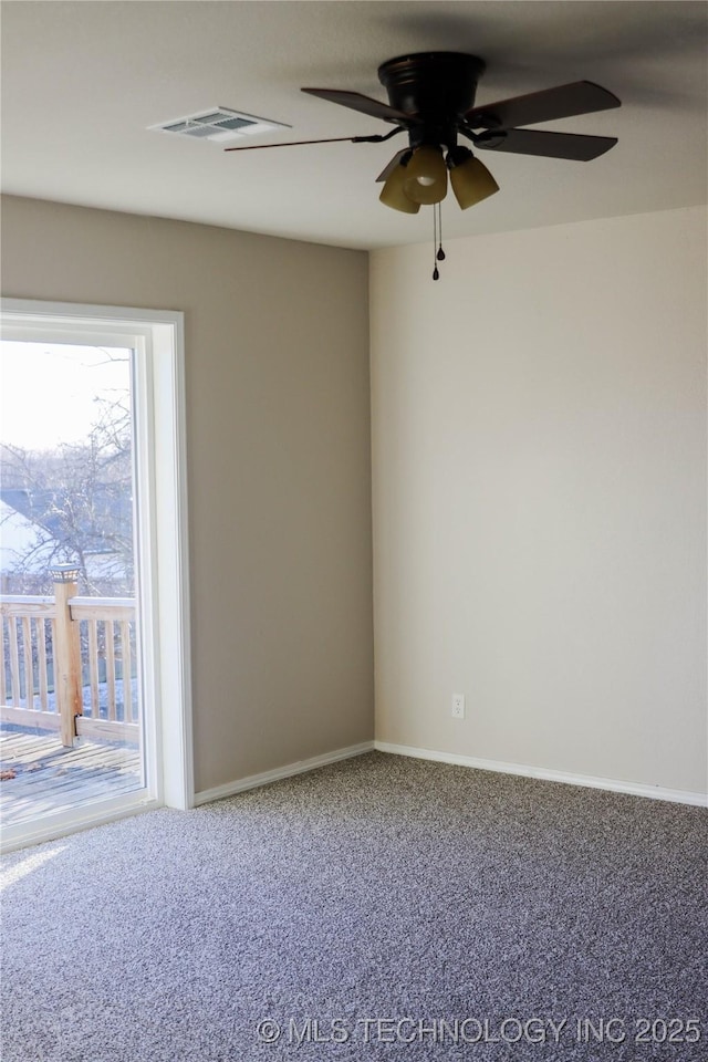 unfurnished room with ceiling fan and carpet floors