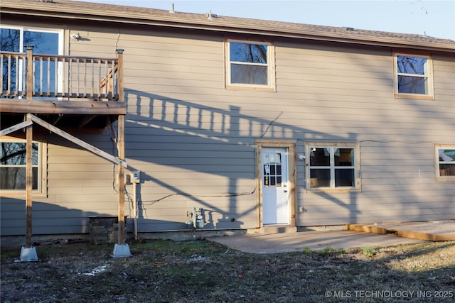 rear view of house featuring a patio area