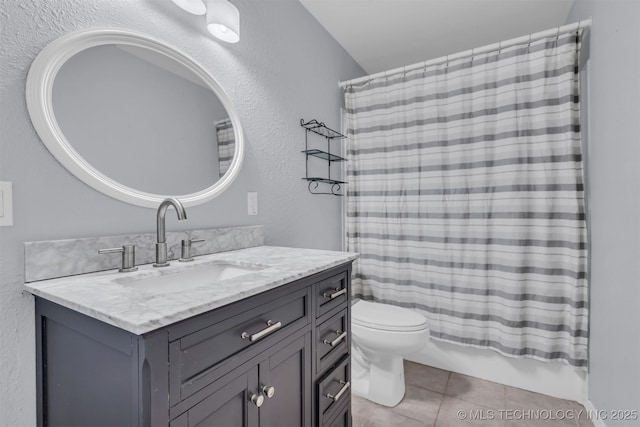 full bathroom with toilet, tile patterned flooring, vanity, and shower / bath combination with curtain