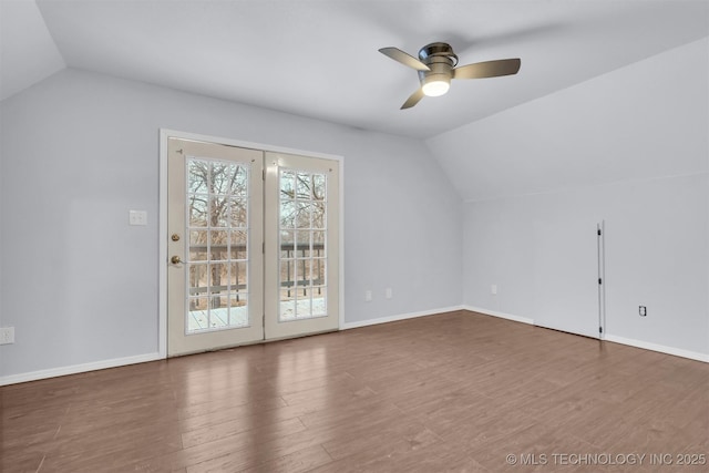 additional living space featuring vaulted ceiling, hardwood / wood-style floors, and ceiling fan