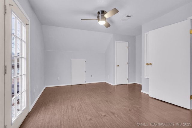 bonus room with hardwood / wood-style flooring, vaulted ceiling, and ceiling fan