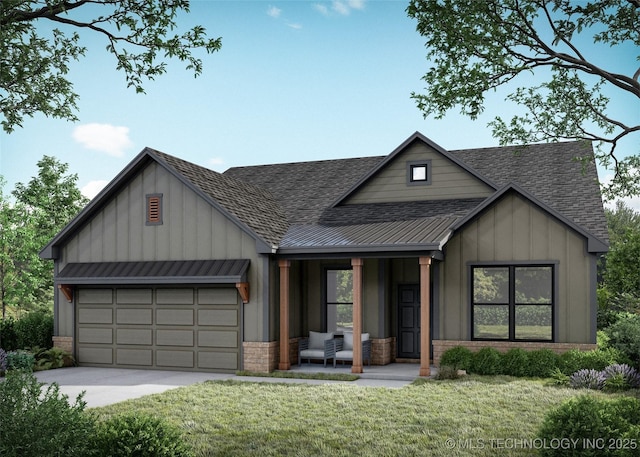 modern farmhouse with covered porch, a front yard, and a garage