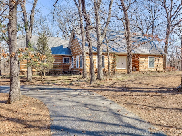 view of log cabin