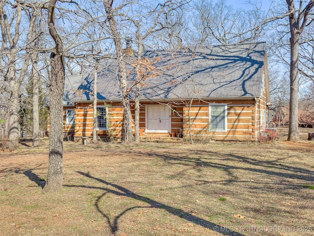 7860 W 16th St, Muskogee, OK 74403 - log cabin with a front yard
