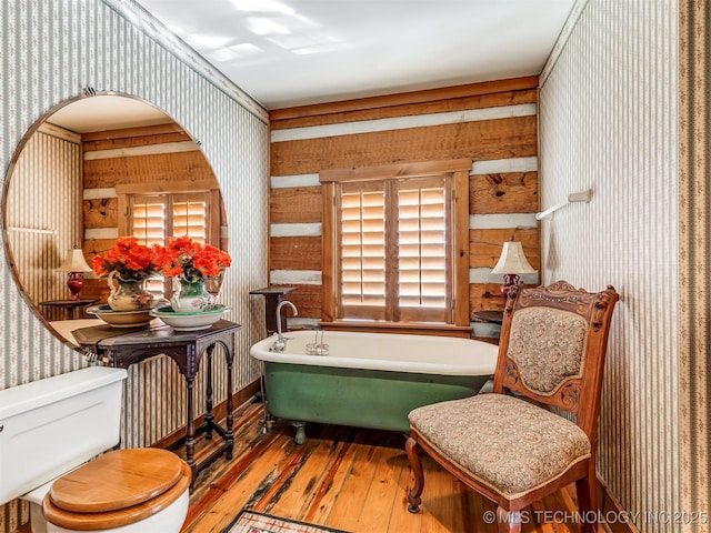 living area featuring hardwood / wood-style floors