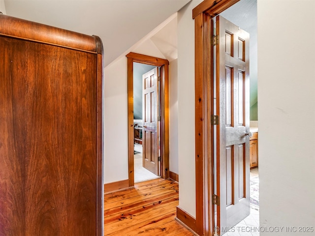 hallway featuring light hardwood / wood-style flooring