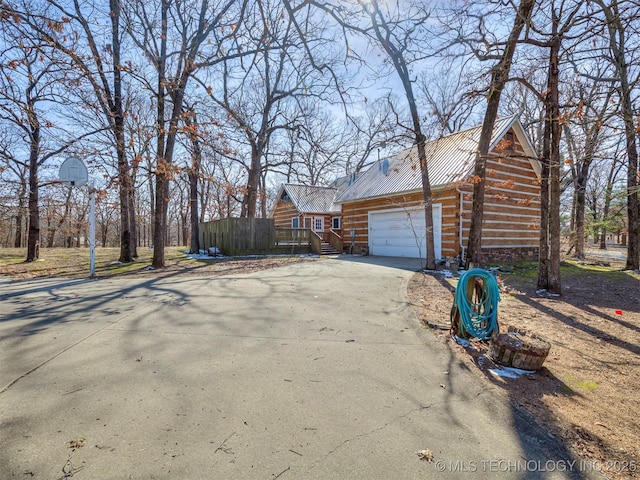 exterior space featuring a garage