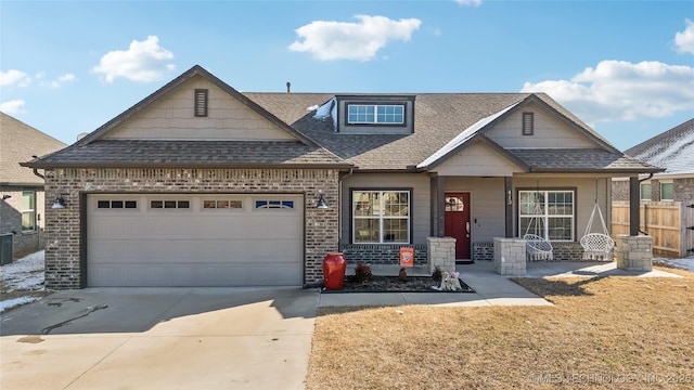 craftsman-style home with a garage and a porch