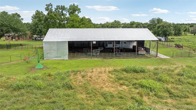 view of outbuilding featuring a rural view