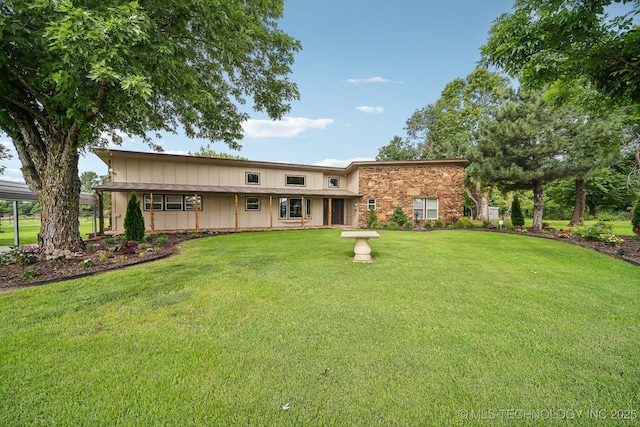 42900 W 11th St, Terlton, OK 74081 - rear view of property featuring a yard and board and batten siding