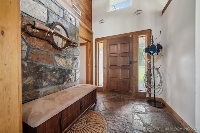 42900 W 11th St, Terlton, OK 74081 - entryway with stone flooring, baseboards, and a towering ceiling