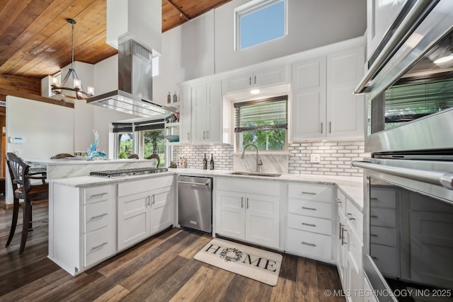 42900 W 11th St, Terlton, OK 74081 - kitchen with wooden ceiling, appliances with stainless steel finishes, a peninsula, a sink, and a chandelier