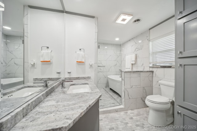 42900 W 11th St, Terlton, OK 74081 - bathroom featuring toilet, a freestanding tub, double vanity, recessed lighting, and a shower