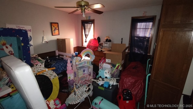 bedroom featuring ceiling fan