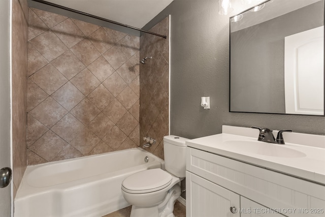 full bath with  shower combination, a textured wall, vanity, and toilet