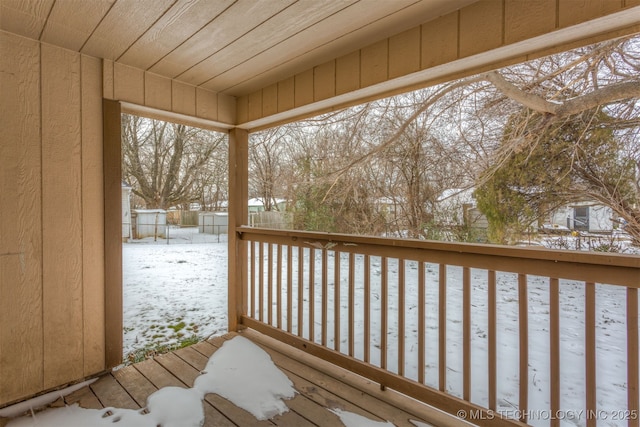 view of snow covered deck