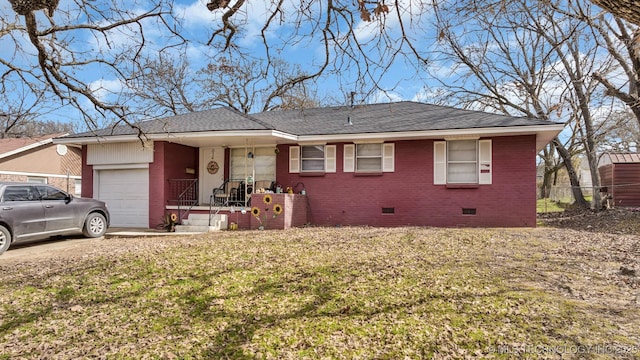 view of front facade with brick siding, roof with shingles, an attached garage, crawl space, and a front lawn