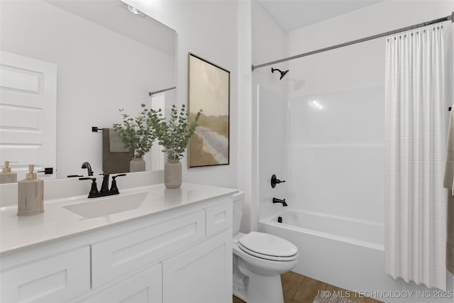 full bathroom featuring shower / bath combination with curtain, vanity, toilet, and wood finished floors