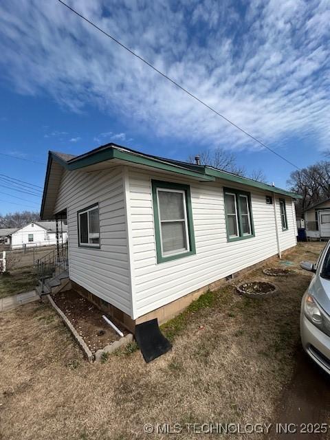 111 N 47th W Ave, Tulsa, OK 74127 - view of home's exterior featuring crawl space