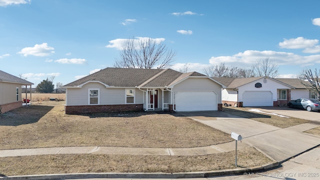 ranch-style home featuring a garage, driveway, brick siding, and roof with shingles