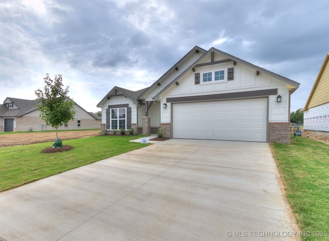 craftsman house with board and batten siding, concrete driveway, brick siding, and a front lawn