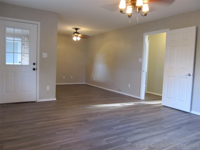 entrance foyer featuring dark wood-style floors, ceiling fan, and baseboards