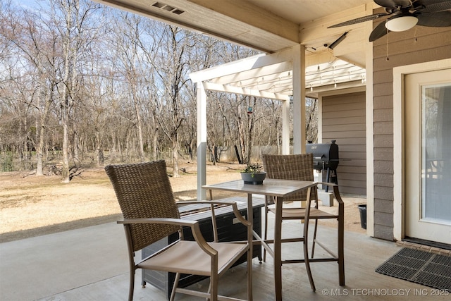 view of patio with outdoor dining area, a grill, a ceiling fan, visible vents, and a pergola