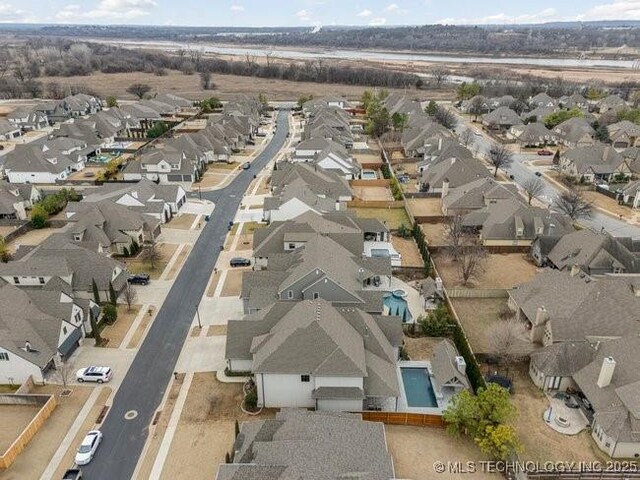 11904 S Toledo Ave, Tulsa, OK 74137 - birds eye view of property with a residential view