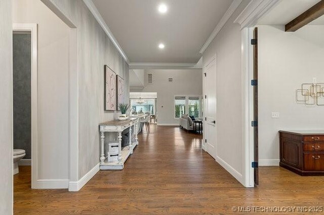 11904 S Toledo Ave, Tulsa, OK 74137 - corridor featuring ornamental molding, beamed ceiling, baseboards, and wood finished floors