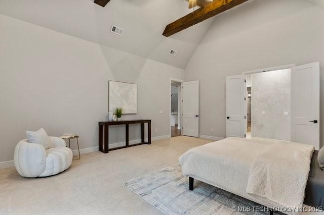 11904 S Toledo Ave, Tulsa, OK 74137 - bedroom with high vaulted ceiling, light colored carpet, visible vents, and baseboards