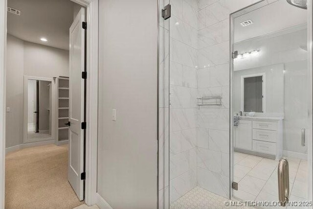 11904 S Toledo Ave, Tulsa, OK 74137 - full bathroom featuring a stall shower, vanity, and baseboards