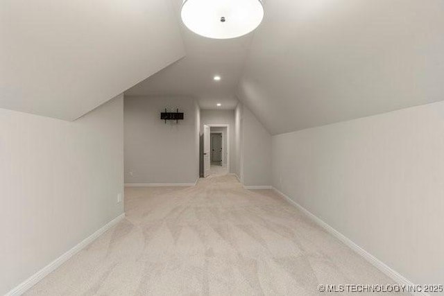 11904 S Toledo Ave, Tulsa, OK 74137 - additional living space with recessed lighting, light carpet, vaulted ceiling, and baseboards