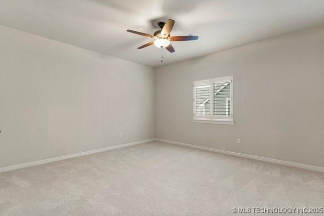 11904 S Toledo Ave, Tulsa, OK 74137 - unfurnished room featuring light carpet, baseboards, and a ceiling fan