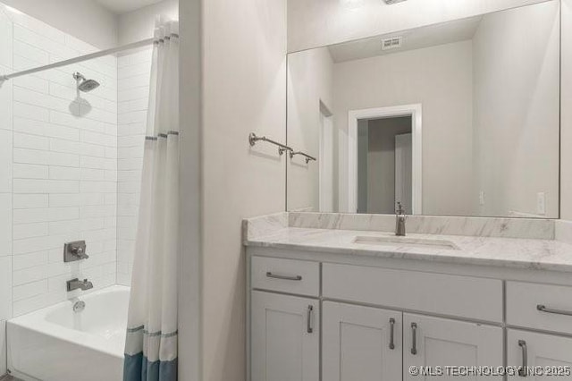 11904 S Toledo Ave, Tulsa, OK 74137 - bathroom with visible vents, shower / bath combo with shower curtain, and vanity
