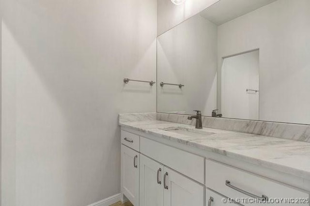 11904 S Toledo Ave, Tulsa, OK 74137 - bathroom with vanity and baseboards