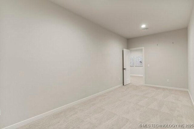 11904 S Toledo Ave, Tulsa, OK 74137 - empty room with baseboards and light colored carpet