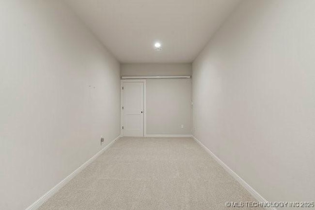 11904 S Toledo Ave, Tulsa, OK 74137 - unfurnished room with baseboards and light colored carpet
