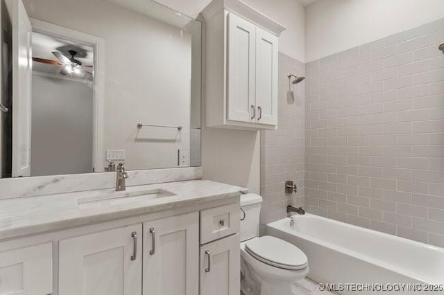 11904 S Toledo Ave, Tulsa, OK 74137 - bathroom with toilet, ceiling fan, tub / shower combination, and vanity