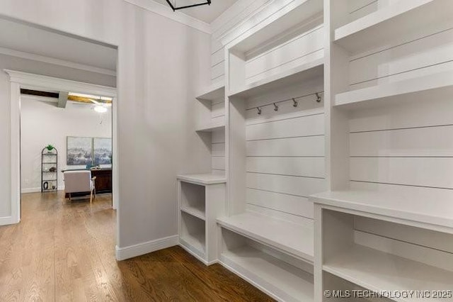 11904 S Toledo Ave, Tulsa, OK 74137 - mudroom featuring ornamental molding, dark wood-style flooring, and baseboards