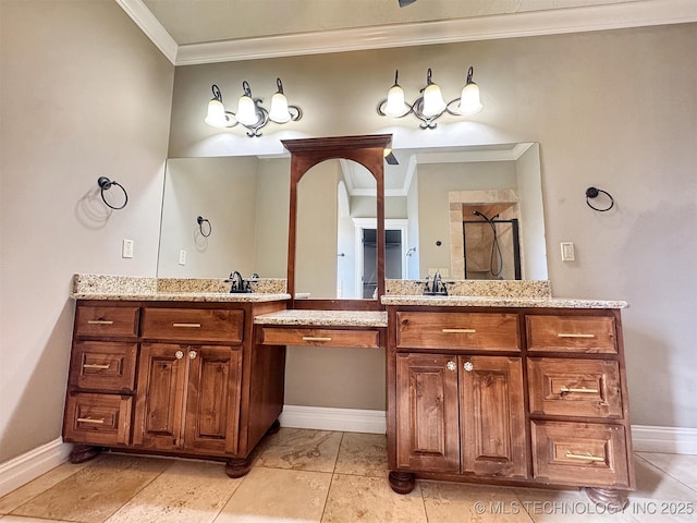 bathroom with ornamental molding, a stall shower, two vanities, and baseboards