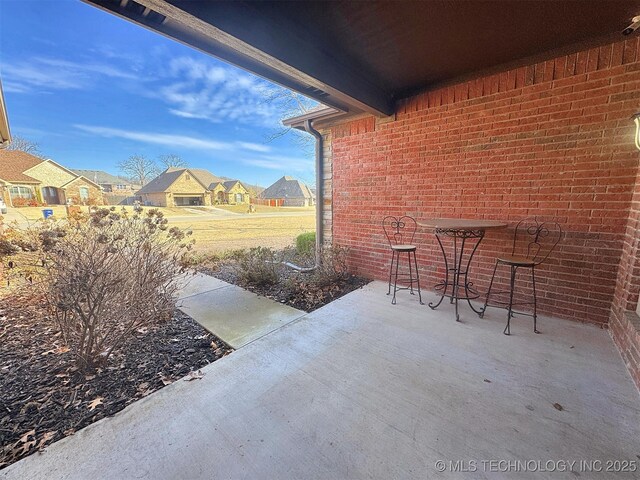 view of patio with a residential view