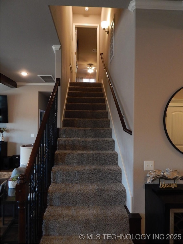 stairs featuring recessed lighting and visible vents