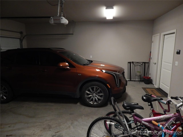 garage featuring a garage door opener