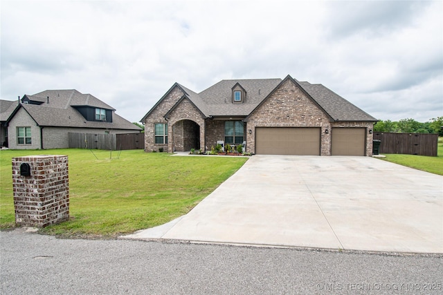 190 N Castle St, Skiatook, OK 74070 - french country style house with brick siding, an attached garage, driveway, and roof with shingles