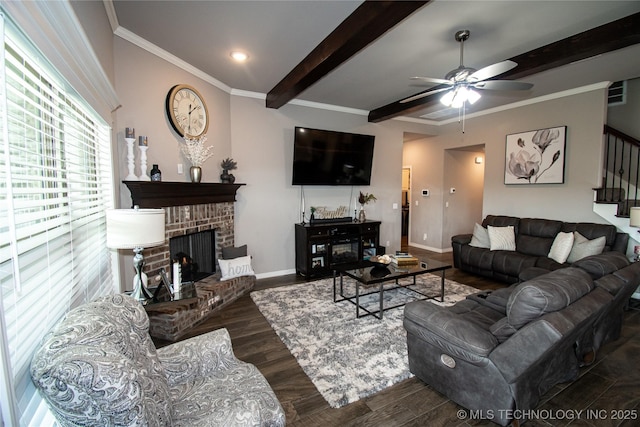 190 N Castle St, Skiatook, OK 74070 - living room with wood finished floors, beam ceiling, stairway, a ceiling fan, and a fireplace