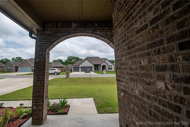 190 N Castle St, Skiatook, OK 74070 - view of patio / terrace with driveway and a residential view