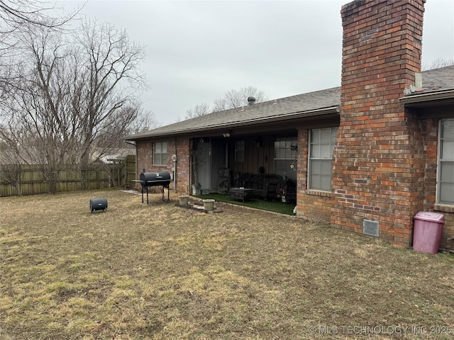 view of yard featuring fence