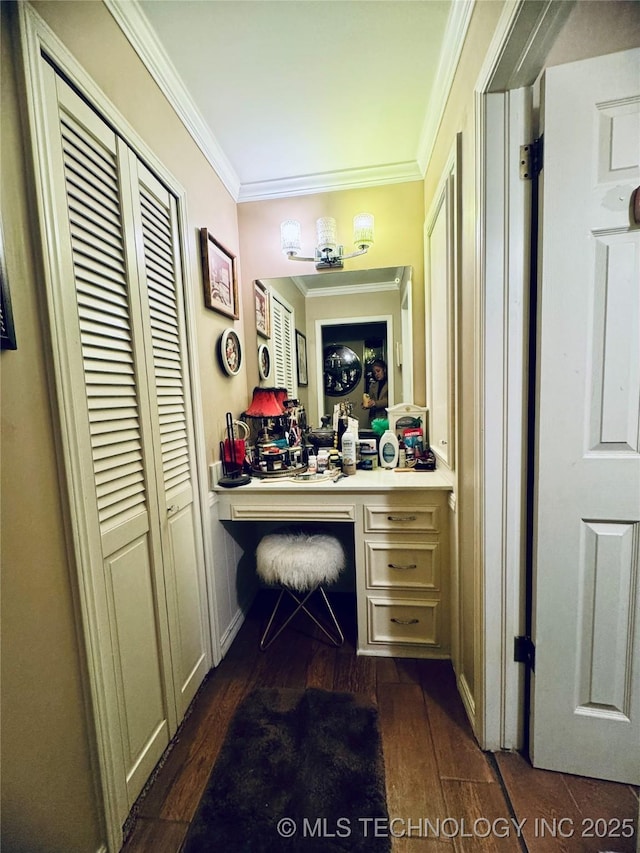 interior space featuring crown molding and wood finished floors