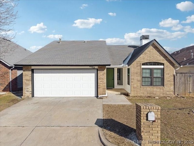 ranch-style house with concrete driveway, brick siding, and an attached garage